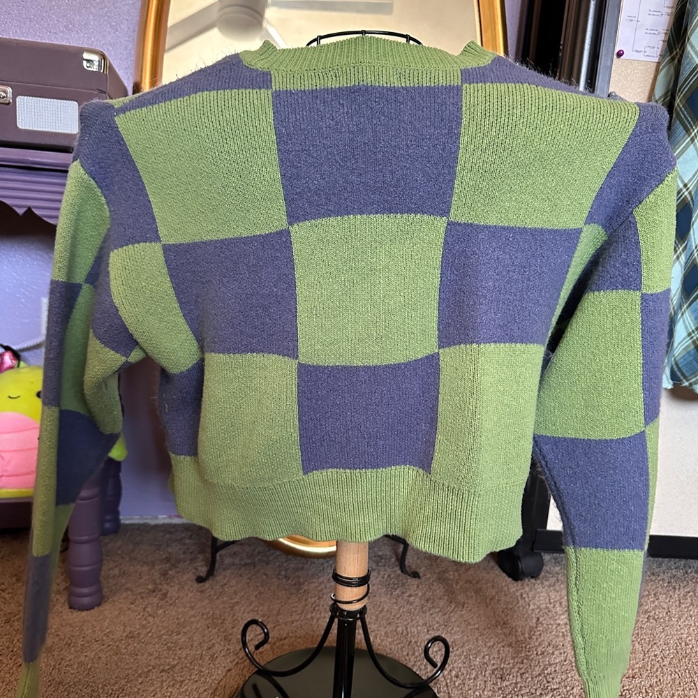 green and blue checkered sweater